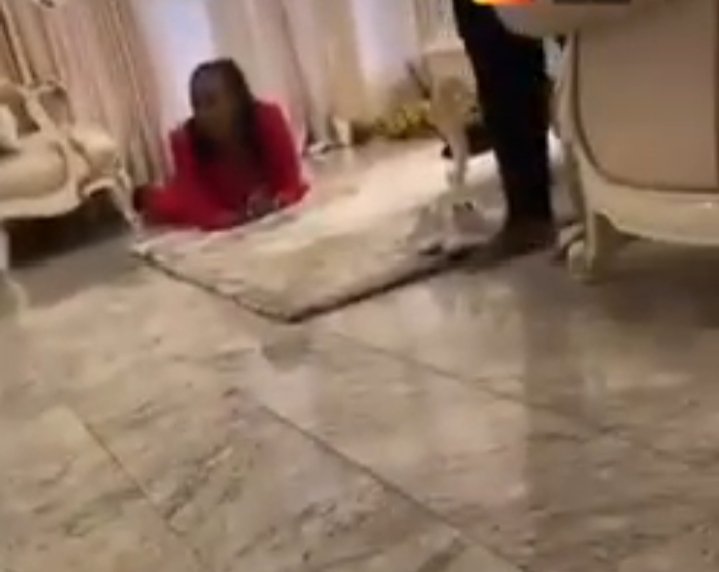 Okorocha's family member, lying on the floor and pleading for God's intervention during siege