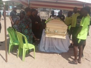 The remains of late Chibueze Cokey (aka. Onye Ball) lying in state in his father's compound.